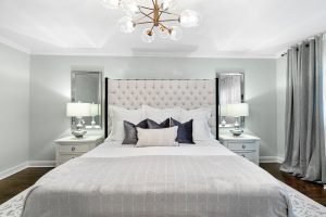 In the bedroom, the fabrics and lighter colour create a high-end, sumptuous feel
