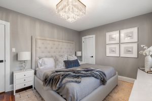 The tones are carried up into the bedroom, where we paired them with luxurious textures and a bit of sparkle in the lighting fixtures for a relaxing but sophisticated feel.